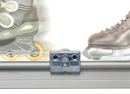 Cojinete lineal híbrido que combina rodadura y deslizamiento