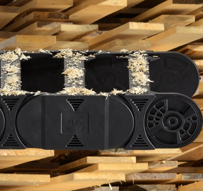 igus presenta en la feria LIGNA 2015 sus cadenas portacables resistentes al polvo y su gama ampliada de cojinetes de fricción