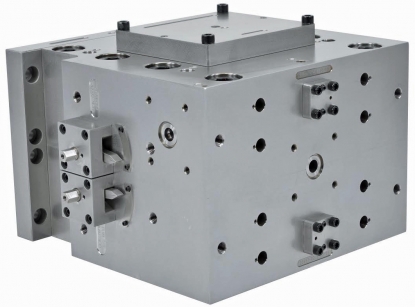 Un bloque de alimentación de Nordson que equilibra las velocidades de flujo de material fundido, en K 2016