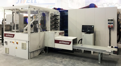 Sistema flexible y compacto con control de cámara para la producción de tapas