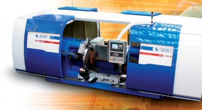 Torno CNC para ruedas de ferrocarril con accionamiento por fricción