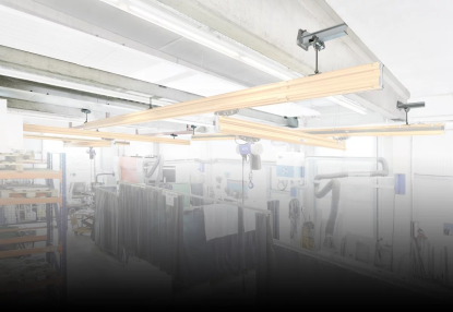 Fijación de grúas suspendidas a vigas de hormigón armado o de madera